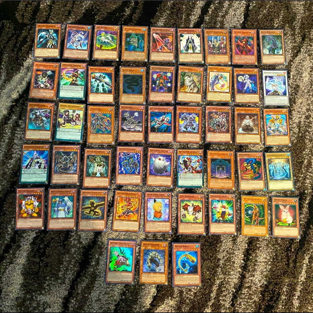 Yu-Gi-Oh card lot with 3 Holo cards